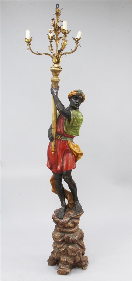 A Venetian style carved and polychrome painted blackamoor torchere, H.6ft 10in.